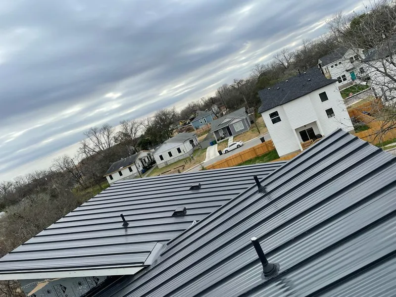 Standing seam metal roof panels with vents for Skylight Repair in Winthrop